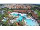 Expansive community pool complex with multiple pools and water slide at 7049 Oakwood St, Davenport, FL 33837