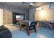 Finished basement with foosball and air hockey tables at 7049 Oakwood St, Davenport, FL 33837
