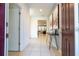 Bright entryway with tile flooring and modern decor at 7049 Oakwood St, Davenport, FL 33837