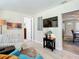 Cozy living area with comfy armchairs and access to the sunroom at 111 10Th St, New Smyrna Beach, FL 32168