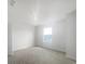 Bright bedroom with neutral carpeting and large window at 3690 Sagefield Dr, St Cloud, FL 34773
