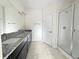 Primary bathroom with double vanity and walk-in shower at 3690 Sagefield Dr, St Cloud, FL 34773