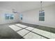 Bright living room with carpet and tile floors at 3690 Sagefield Dr, St Cloud, FL 34773