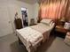 Bedroom with a twin-size bed and walk-in closet at 7313 Cabor Ct, Orlando, FL 32818