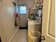 Laundry room with washer, dryer and exterior access at 7313 Cabor Ct, Orlando, FL 32818