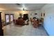 Open dining area with adjoining living space at 7313 Cabor Ct, Orlando, FL 32818