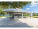 Covered outdoor gazebo with seating and bar at 4243 Paragraph Dr, Kissimmee, FL 34746