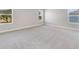 Spacious bedroom with carpet flooring and multiple windows at 2993 Water Clover Ct, Apopka, FL 32712