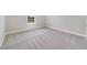 Bright bedroom with carpet flooring and a window at 2993 Water Clover Ct, Apopka, FL 32712