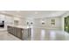 Open concept kitchen with an island and stainless steel appliances at 2993 Water Clover Ct, Apopka, FL 32712