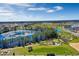 Aerial photo of a community with lake, park, and playground at 14034 Scarlet Aster Aly, Winter Garden, FL 34787