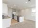 Open concept kitchen with stainless steel appliances and granite countertops at 1357 Current Pl, Haines City, FL 33844