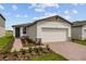 Single-story home with two-car garage at 1357 Current Pl, Haines City, FL 33844