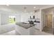 Open kitchen featuring granite island and stainless steel appliances at 1357 Current Pl, Haines City, FL 33844