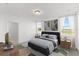 Main bedroom with wood furniture and large windows at 2466 Leeds St, Haines City, FL 33844