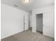 Well-lit bedroom with double door closet and carpet floors at 2466 Leeds St, Haines City, FL 33844