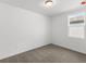 Bright bedroom featuring a window and neutral wall colors at 2466 Leeds St, Haines City, FL 33844