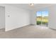 Bedroom with sliding glass doors and backyard access at 2466 Leeds St, Haines City, FL 33844