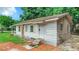 Small white house with yellow shutters and a small front porch at 5136 Mcdonald Rd, Zellwood, FL 32798