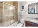 Full bathroom with shower/tub, granite vanity and decorative mirror at 7576 Excitement Dr, Reunion, FL 34747