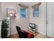 Game room with two gaming chairs, a TV, and a floor lamp at 7576 Excitement Dr, Reunion, FL 34747