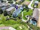 Aerial view of house with backyard and pool at 7576 Excitement Dr, Reunion, FL 34747