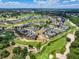 Aerial view of home on golf course community at 7576 Excitement Dr, Reunion, FL 34747