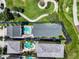 Aerial view showing home with pool and spa at 7576 Excitement Dr, Reunion, FL 34747