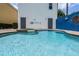 Inviting pool and spa with a fun mural, perfect for relaxation at 7576 Excitement Dr, Reunion, FL 34747
