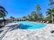 Community pool with plenty of lounge chairs at 1009 Rivers Crossing St, Clermont, FL 34714