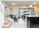 Open concept kitchen and living space with view of pool at 2429 Dubai St, Kissimmee, FL 34747