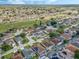 Aerial view of neighborhood with houses and pools at 442 Ella Mae Dr, Davenport, FL 33897