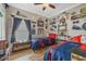 Thematic bedroom with twin beds, plenty of storage, and sports decor at 442 Ella Mae Dr, Davenport, FL 33897