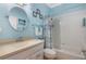 Clean bathroom with a shower/tub combo, and updated vanity at 442 Ella Mae Dr, Davenport, FL 33897