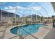 Enjoy this refreshing screened pool with plenty of space to relax at 442 Ella Mae Dr, Davenport, FL 33897