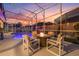 Relaxing pool and patio area with fire pit, perfect for entertaining at 442 Ella Mae Dr, Davenport, FL 33897