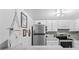 Modern kitchen with stainless steel appliances and updated backsplash at 200 Maitland Ave # 20, Altamonte Springs, FL 32701
