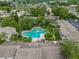 Aerial view of community pool and surrounding condo buildings at 200 Maitland Ave # 20, Altamonte Springs, FL 32701