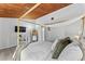 Main bedroom with large bed and wood ceiling at 200 Maitland Ave # 20, Altamonte Springs, FL 32701