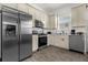 Modern kitchen with stainless steel appliances and ample cabinet space at 2956 Salted Rim Rd, Kissimmee, FL 34747