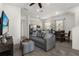 Open living area with kitchen, featuring a comfortable couch and dining area at 2956 Salted Rim Rd, Kissimmee, FL 34747