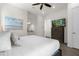 Bright bedroom with king bed and en-suite bathroom at 2956 Salted Rim Rd, Kissimmee, FL 34747