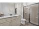 Clean bathroom with a shower, toilet and vanity at 2956 Salted Rim Rd, Kissimmee, FL 34747