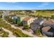 Community view with colorful houses and landscape at 2956 Salted Rim Rd, Kissimmee, FL 34747