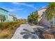 Relaxing community path with landscaping and access to homes at 2956 Salted Rim Rd, Kissimmee, FL 34747