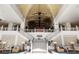 Grand lobby with double staircase and high ceilings at 2956 Salted Rim Rd, Kissimmee, FL 34747