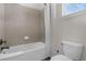 Simple bathroom with shower/tub combo and toilet at 2956 Salted Rim Rd, Kissimmee, FL 34747