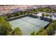 Aerial view of two tennis courts in a community at 5300 Oakbourne Ave, Davenport, FL 33837