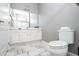Clean bathroom with white cabinets and tiled floors at 5300 Oakbourne Ave, Davenport, FL 33837