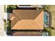 Top-down view of house showing tile roof and screened-in pool at 5300 Oakbourne Ave, Davenport, FL 33837